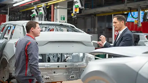 Audi cars being built in factory