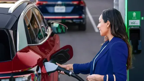 woman charging her Volkswagen ID.4 car 
