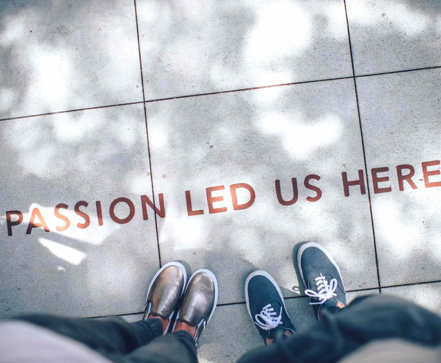 Image of sidewalk with words "Passion led us here"