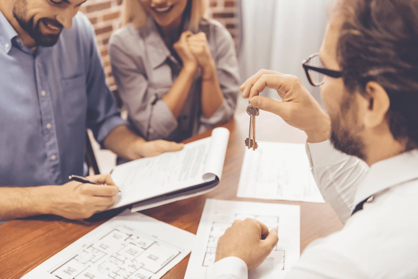 Property manager in Carson City, NV giving keys to tenants