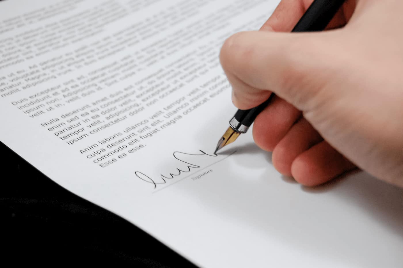 Signing a rental lease agreement during tenant move-in