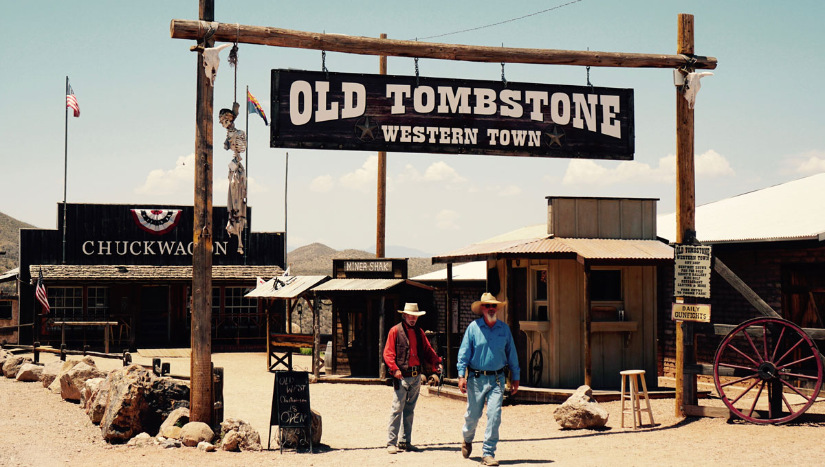 why do cowboys wear big belt buckles