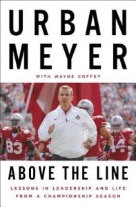 Urban Meyer running onto the Ohio State University football field