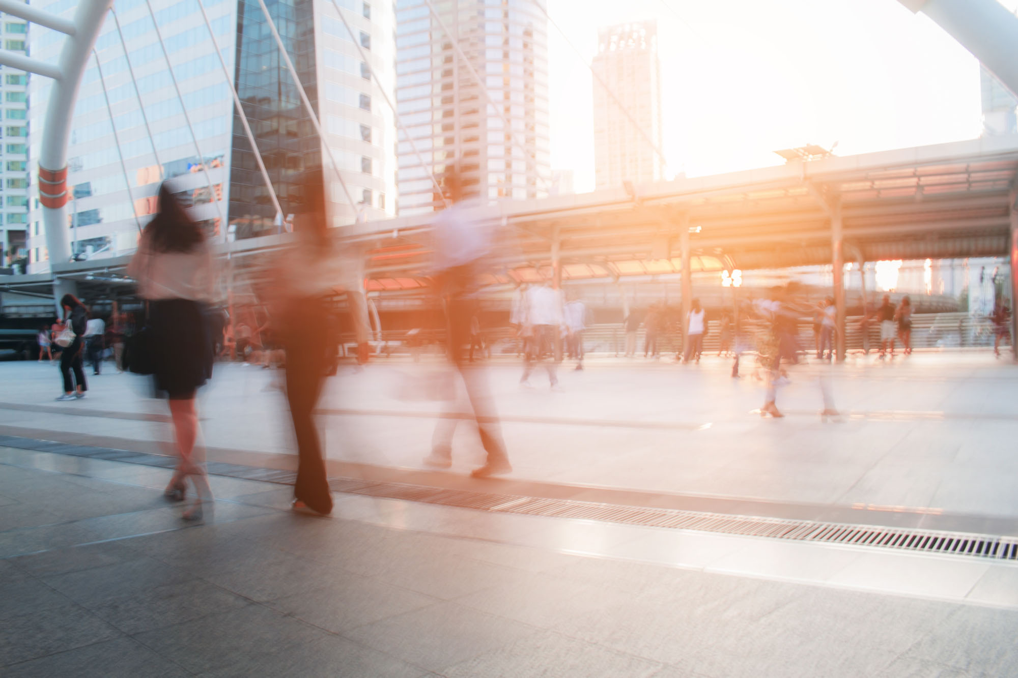 bright light behind pedestrians representing lunavi illuminating technology solutions