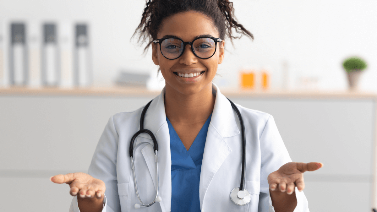 Doctor smiling and reaching out hands