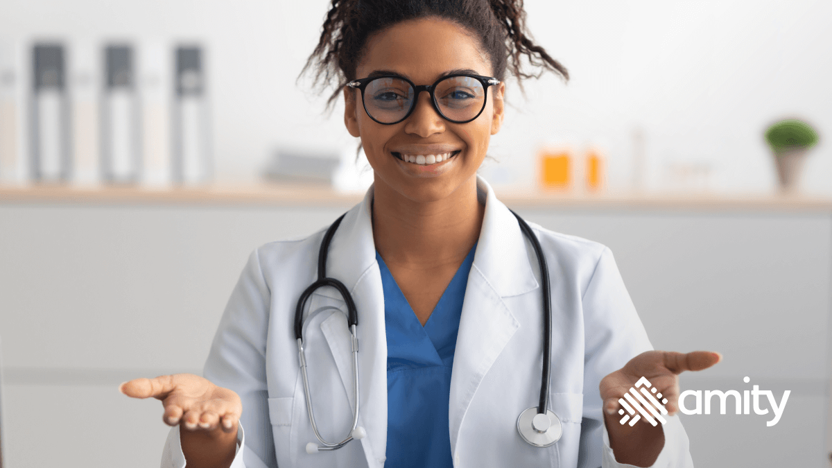 Doctor smiling and reaching out hands