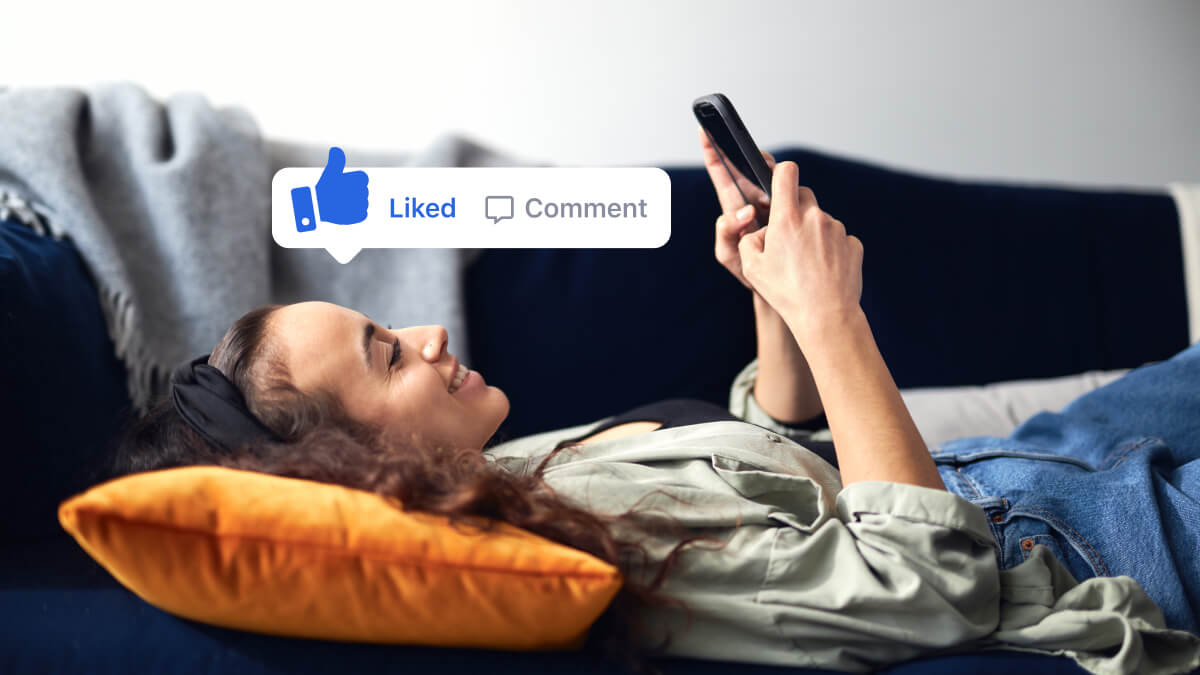 Girl with smartphone on couch engaging with a social media app