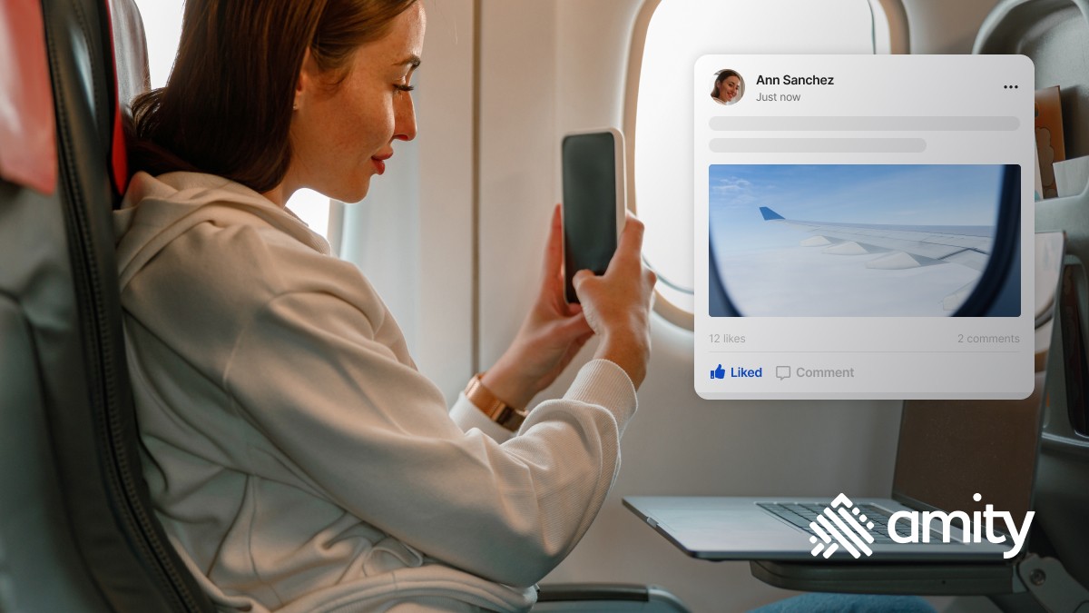 Woman taking picture in airplane and posting on social