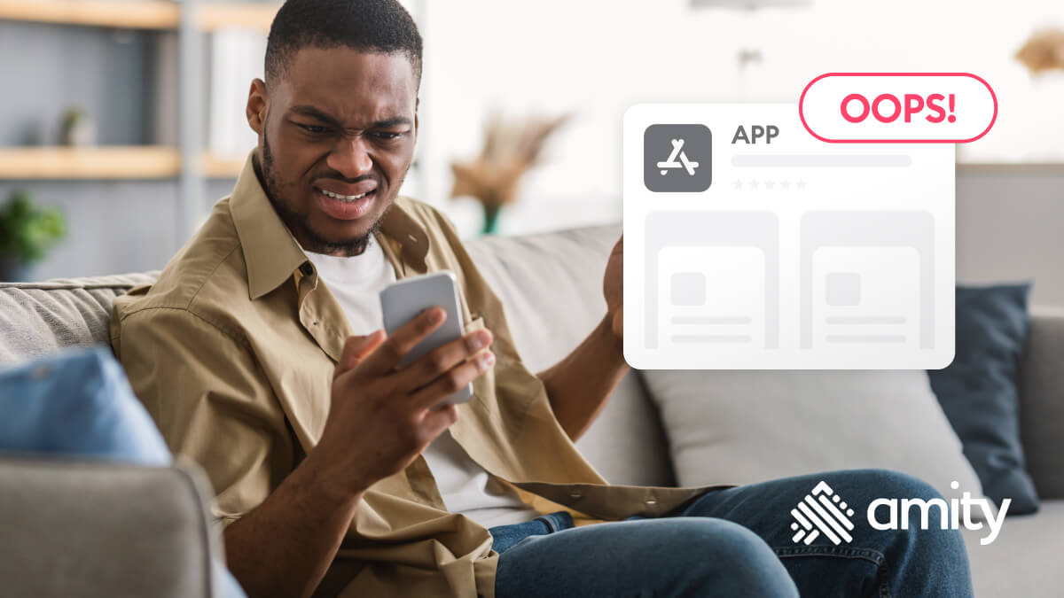 A guy looking at apps on his smartphone