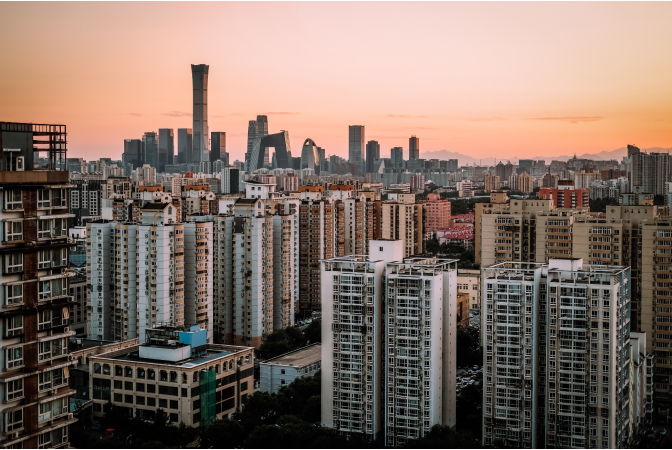 City in a developing country, where carbon footprints are smaller on average.