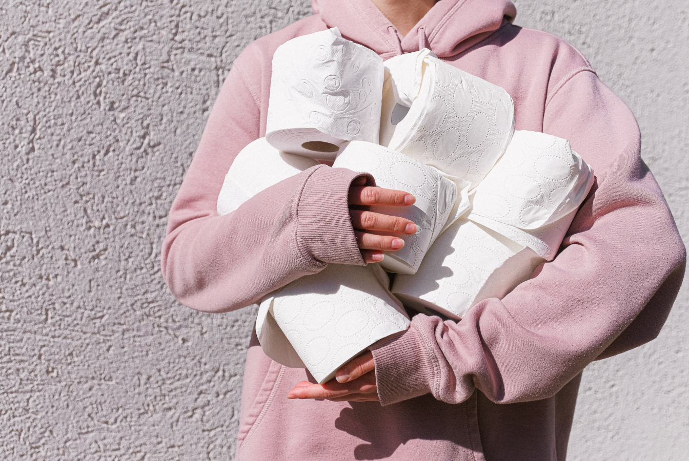 A person hoarding rolls of toilet pper during the coronavirus pandemic.