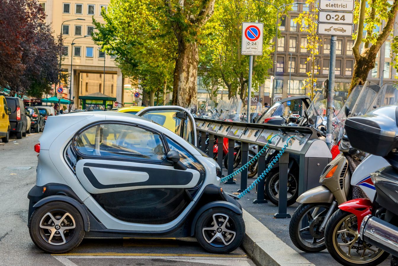 Small electric vehicle at charging station