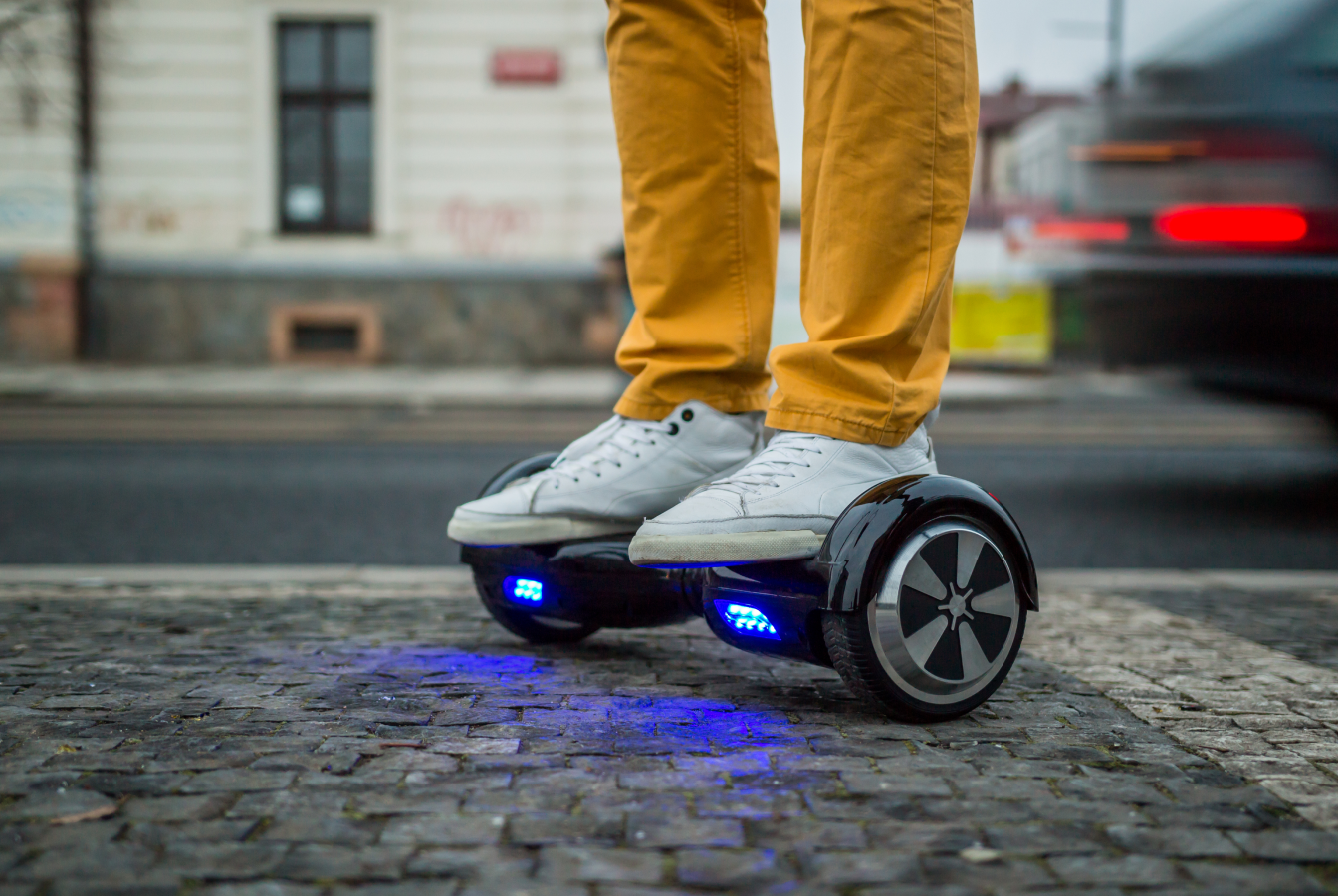 Man standing on hoverboard
