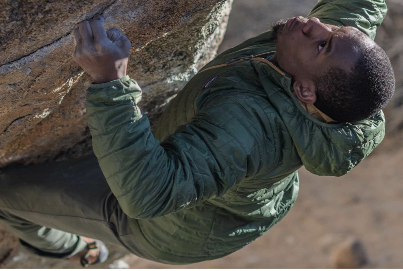 Man climbing a rock face