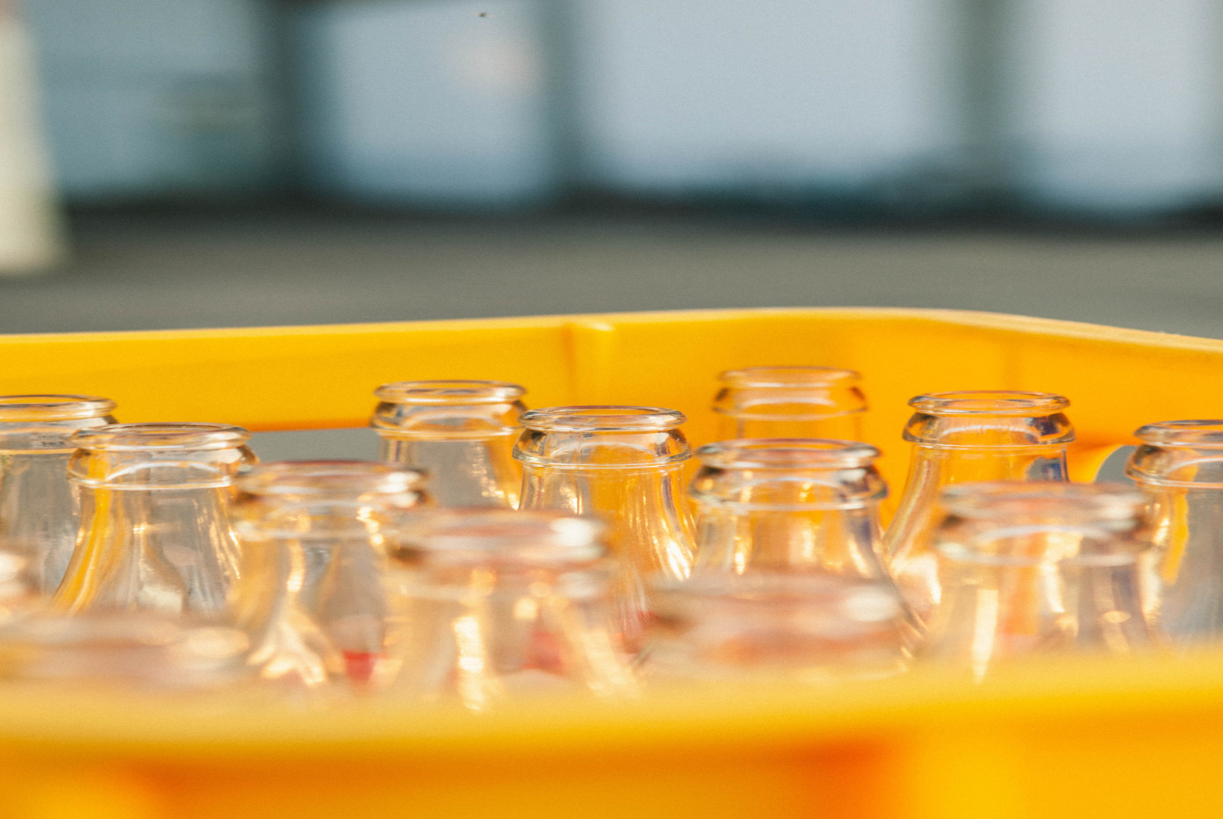 Crate of glass milk bottles