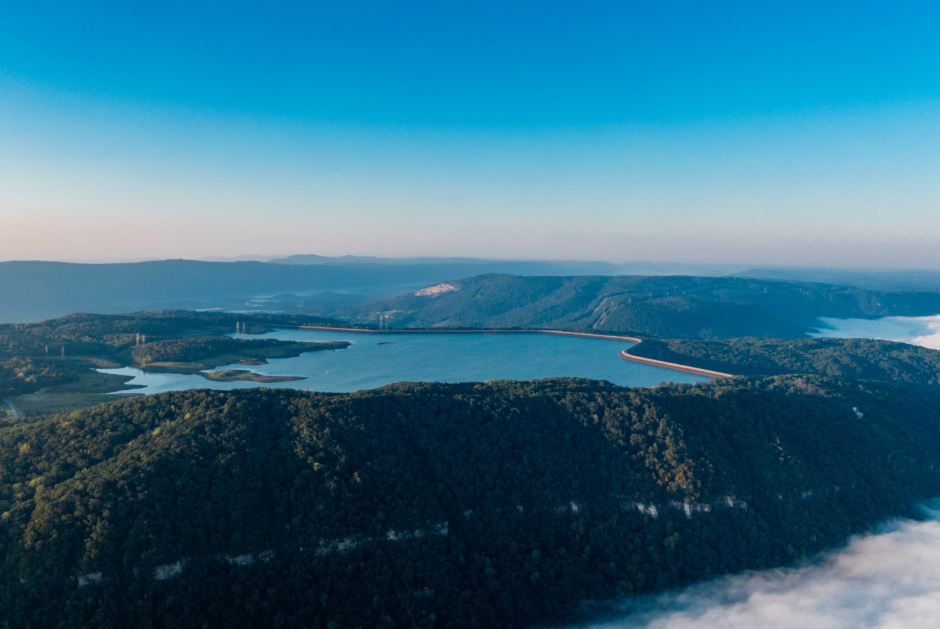 Tree covered mountain with lakes surrounding