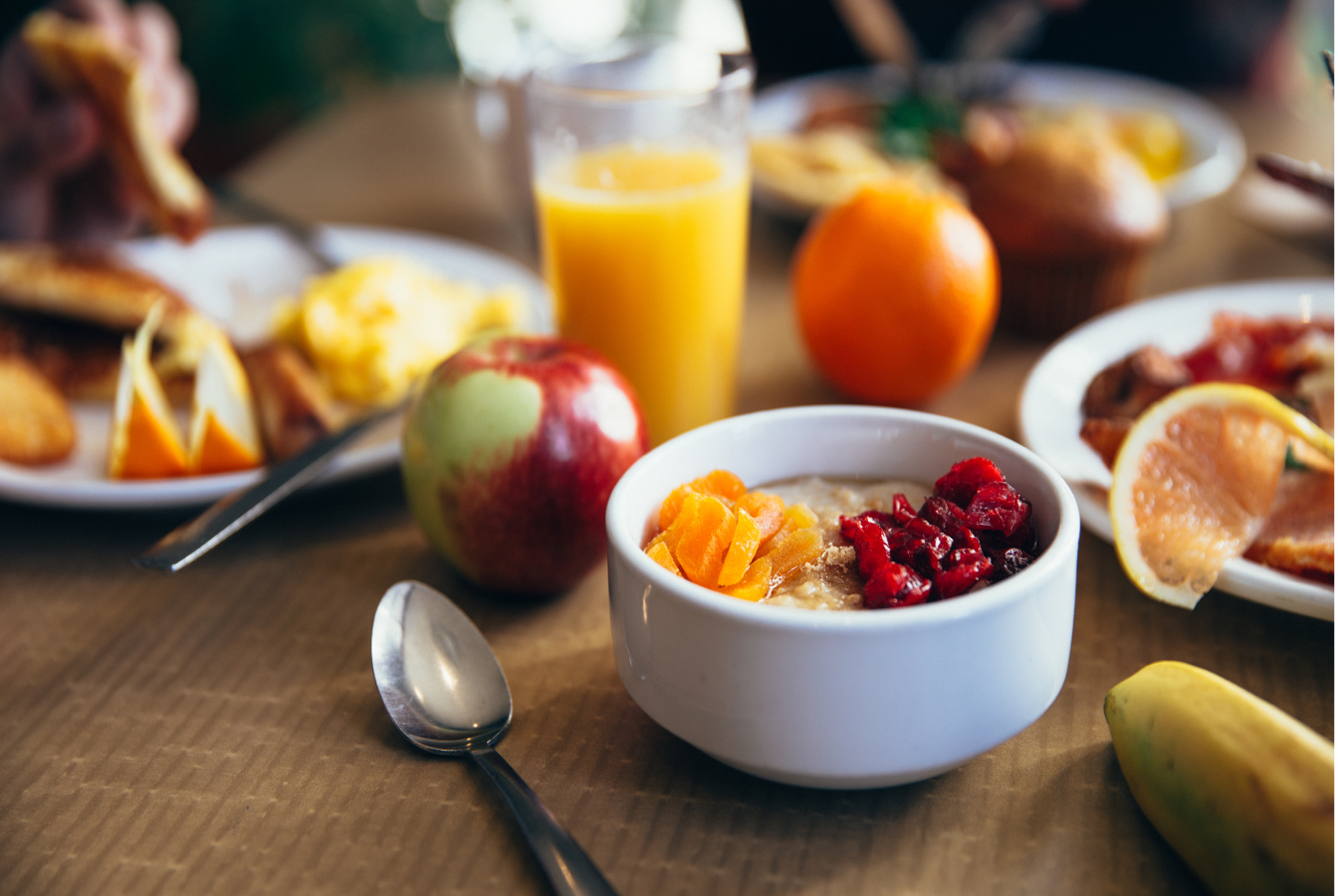 A healthy breakast, consisting of mostly fruits and oatmeal