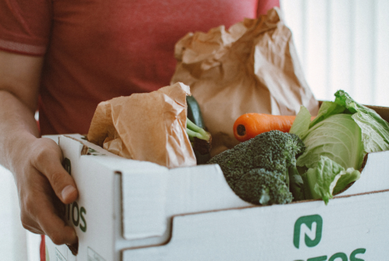 A meal kit delivery of vegetables being used for a meat-free meal