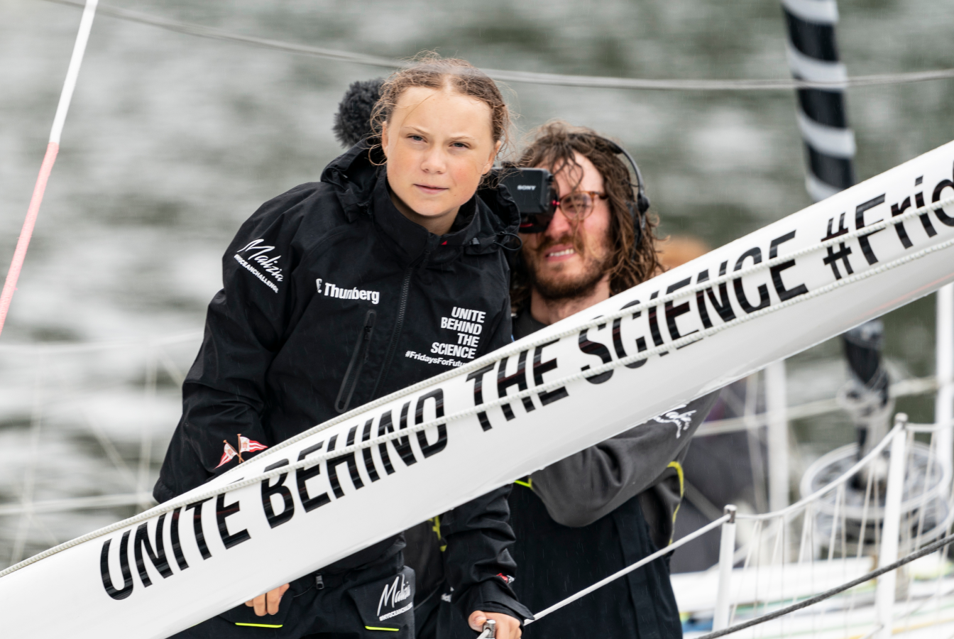 Greta Thurnberg on a sailboat en route to COP19.