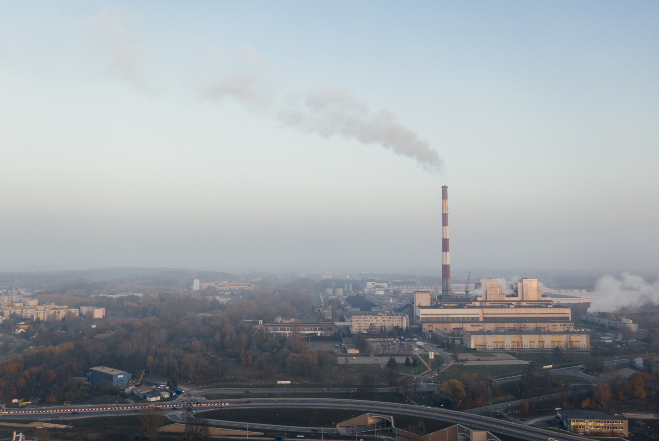 Industrial factory emitting carbon dioxide into the atmosphere