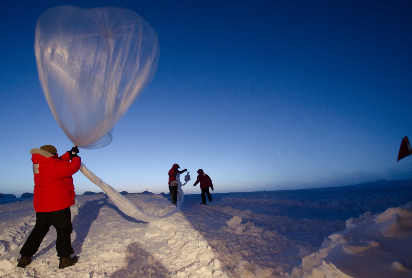 Scientists launch an ozonesonde balloon