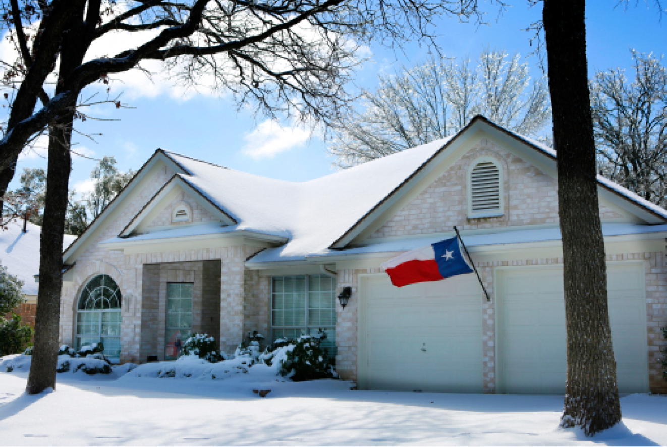 A home in Texas covered in snow during the cold snap in February 2021.
