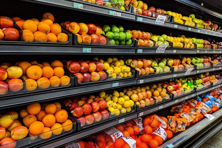 An aisle of fruits at a supermarket