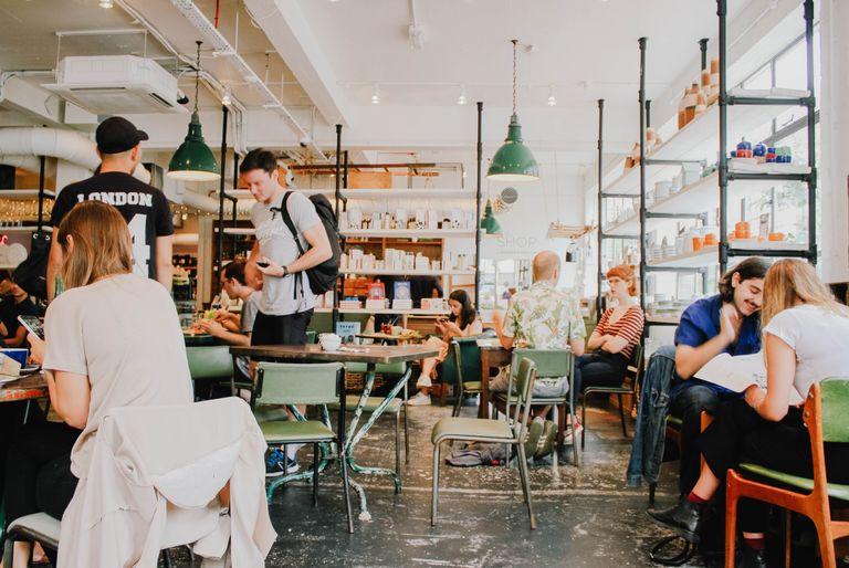 A group of people hanging out in a cafe
