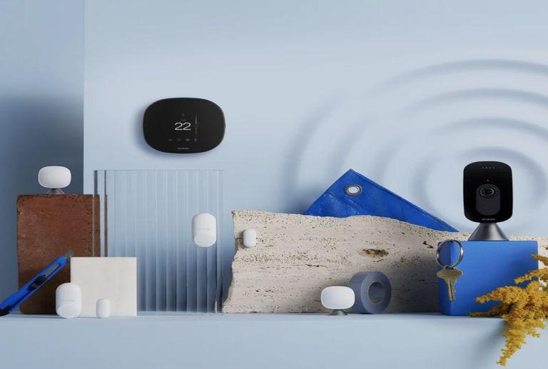 Ecobee thermostat, sensors and camera on a table