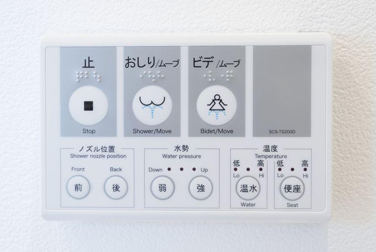 A control panel for a Japanese bidet with water pressure, water temperature and shower nozzle position options.
