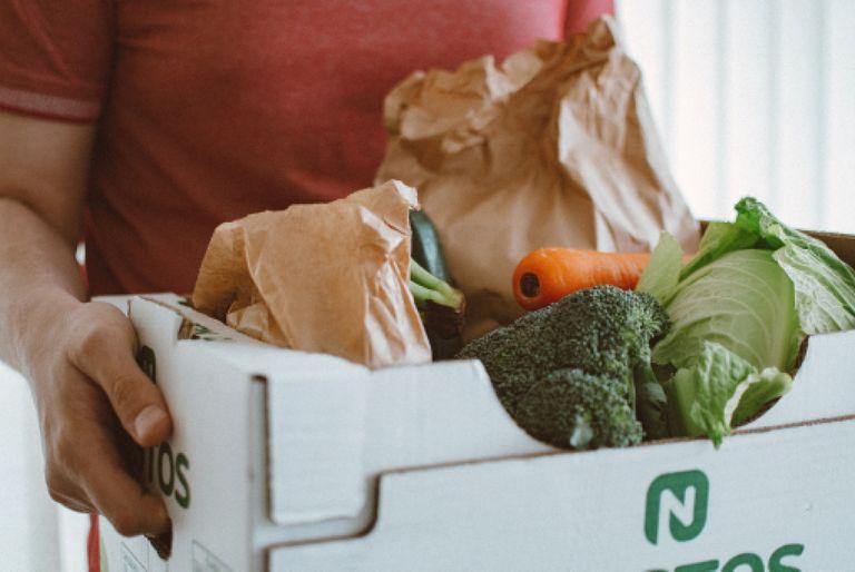 A meal kit delivery of sustainable vegetables being used for a meat-free meal