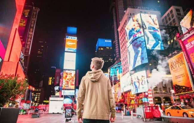 Person in the middle of Time Square in New York City