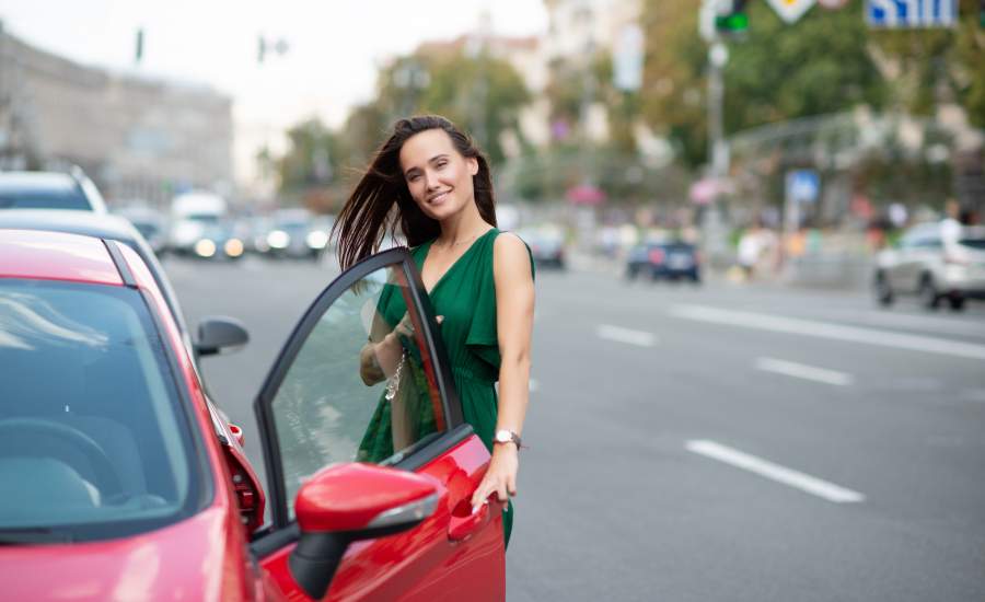 woman opening car door