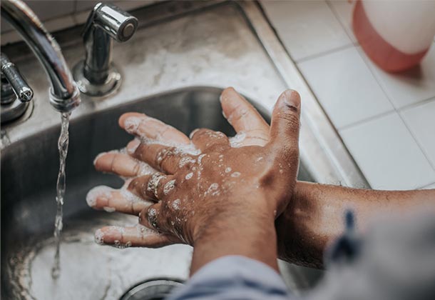 Man washing his hands