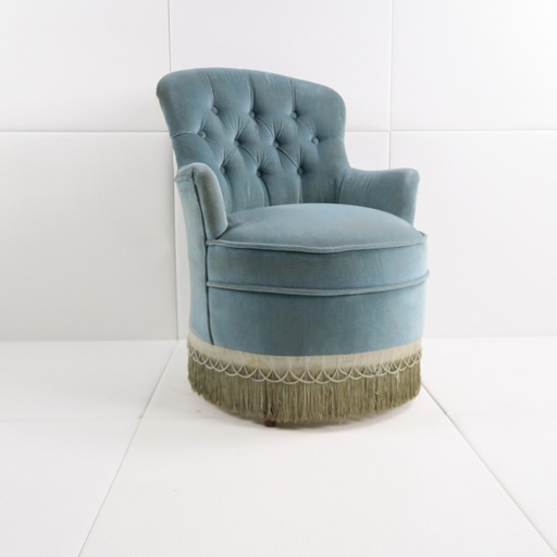 fauteuil velours bleu sarcelle à franges délavées