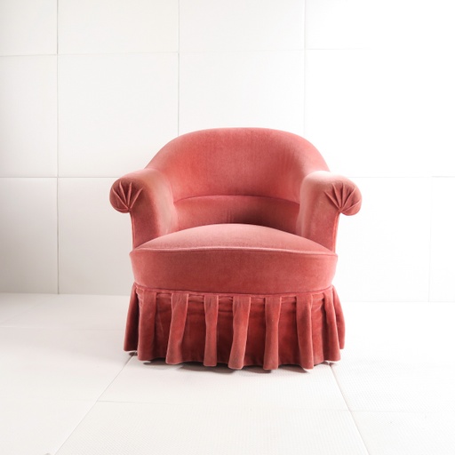 fauteuil en velours rose incarnadin