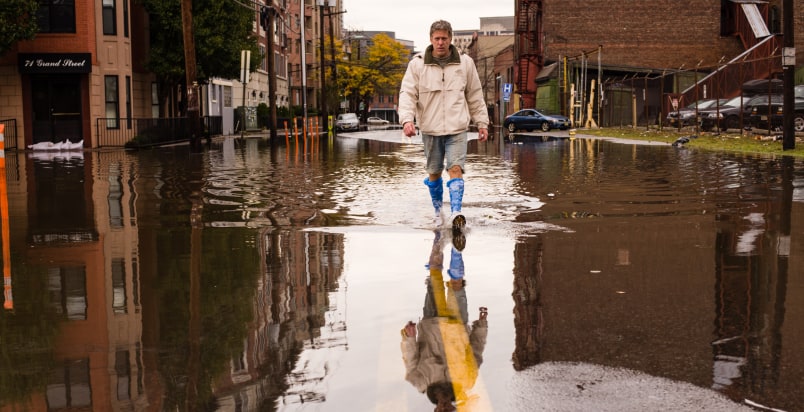 man facing hurricane