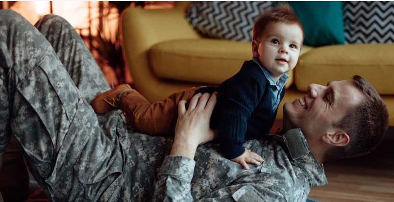dad holding baby