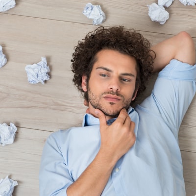 Man Thinking About Paper