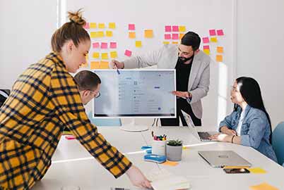 An instructor at ABM College teaches his student the principles of Digital Marketing