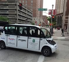 Buzzing around downtown in an electric cab