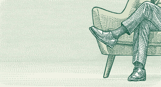 photo of feet sitting in a chair