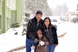 Camille and Family in playing out in the snow in New Mexico