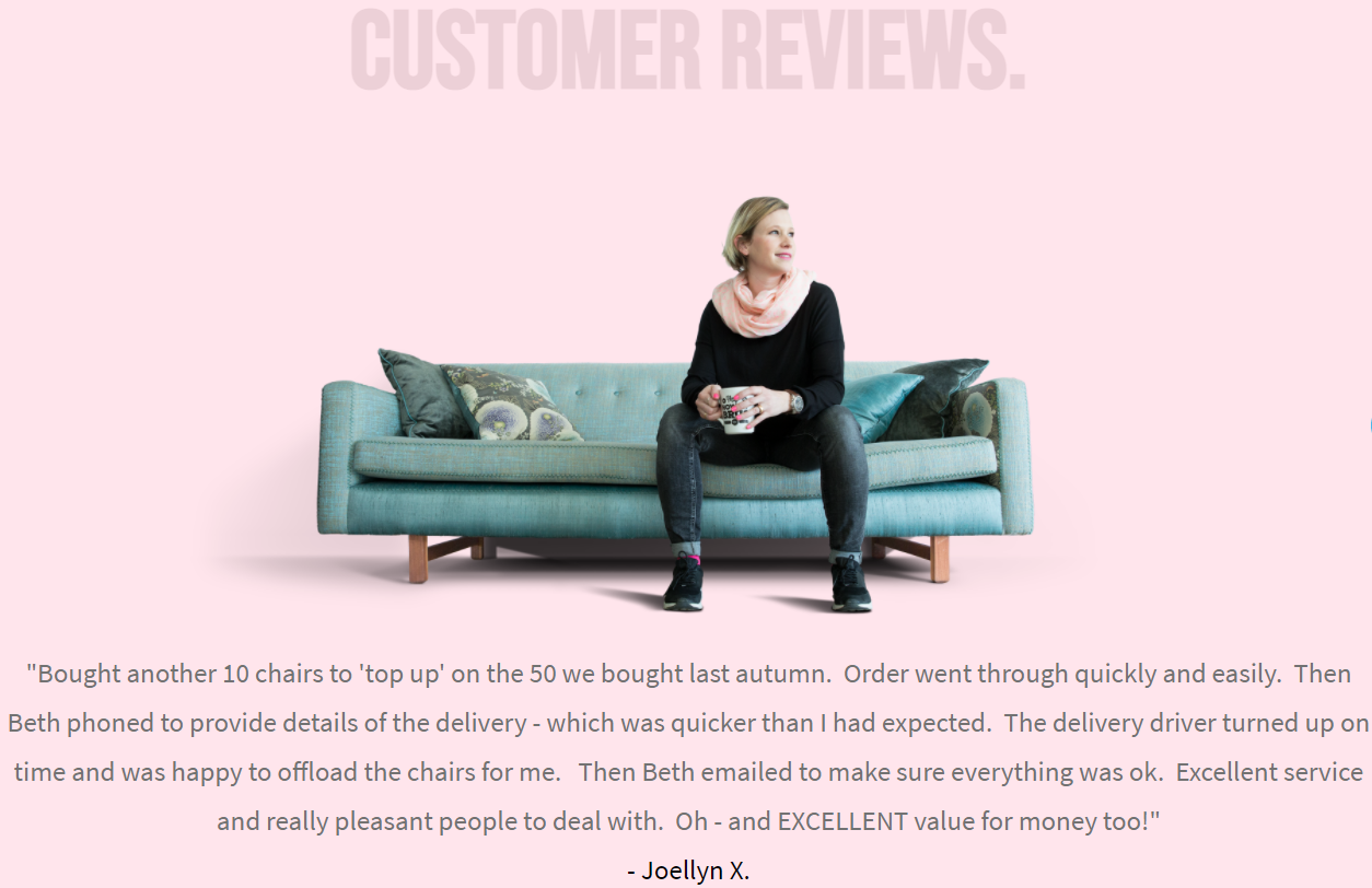 lady sitting on a couch along with her feedback on the furniture company