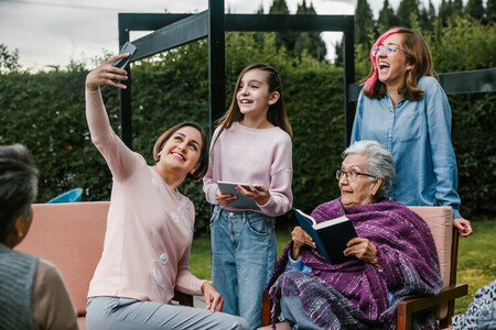 4 women of various ages pose for a selfie