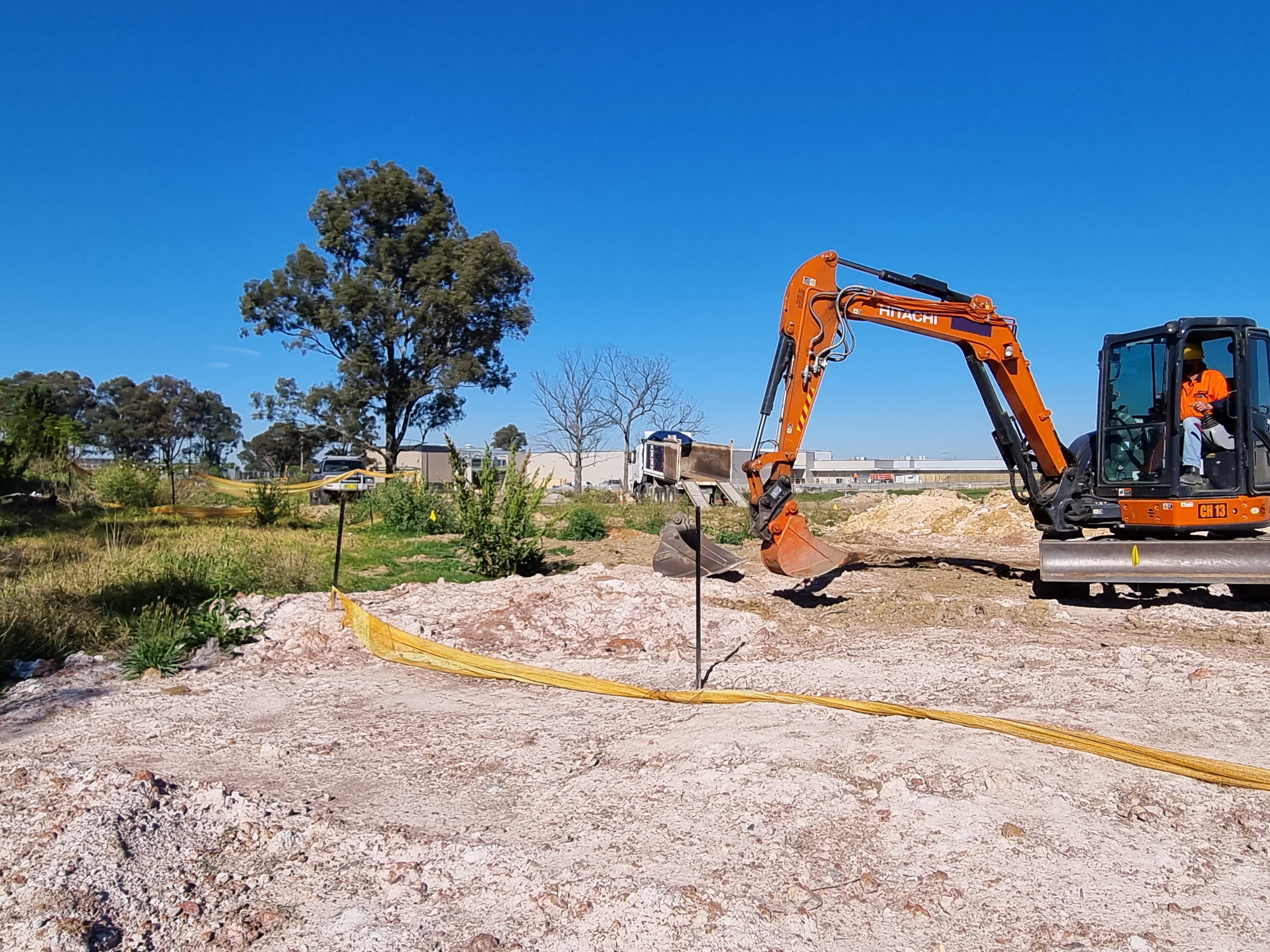 Soil excavator in progress removing waste