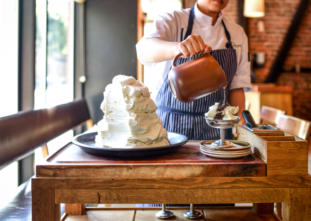 Labor Day take-home box with prawns, corn, and pie.