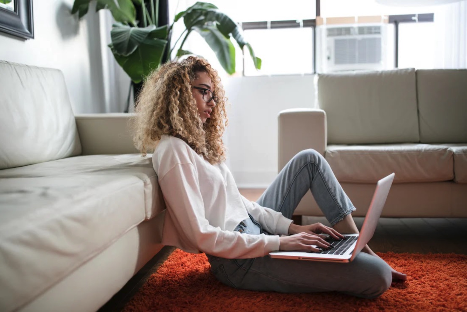 girl on her laptop telehealth