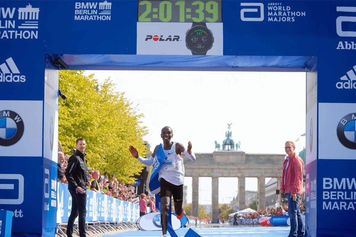 Eliud Kipchoge crosses finish line Berlin