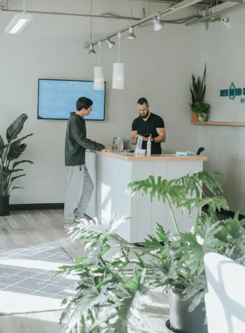 man paying over the counter